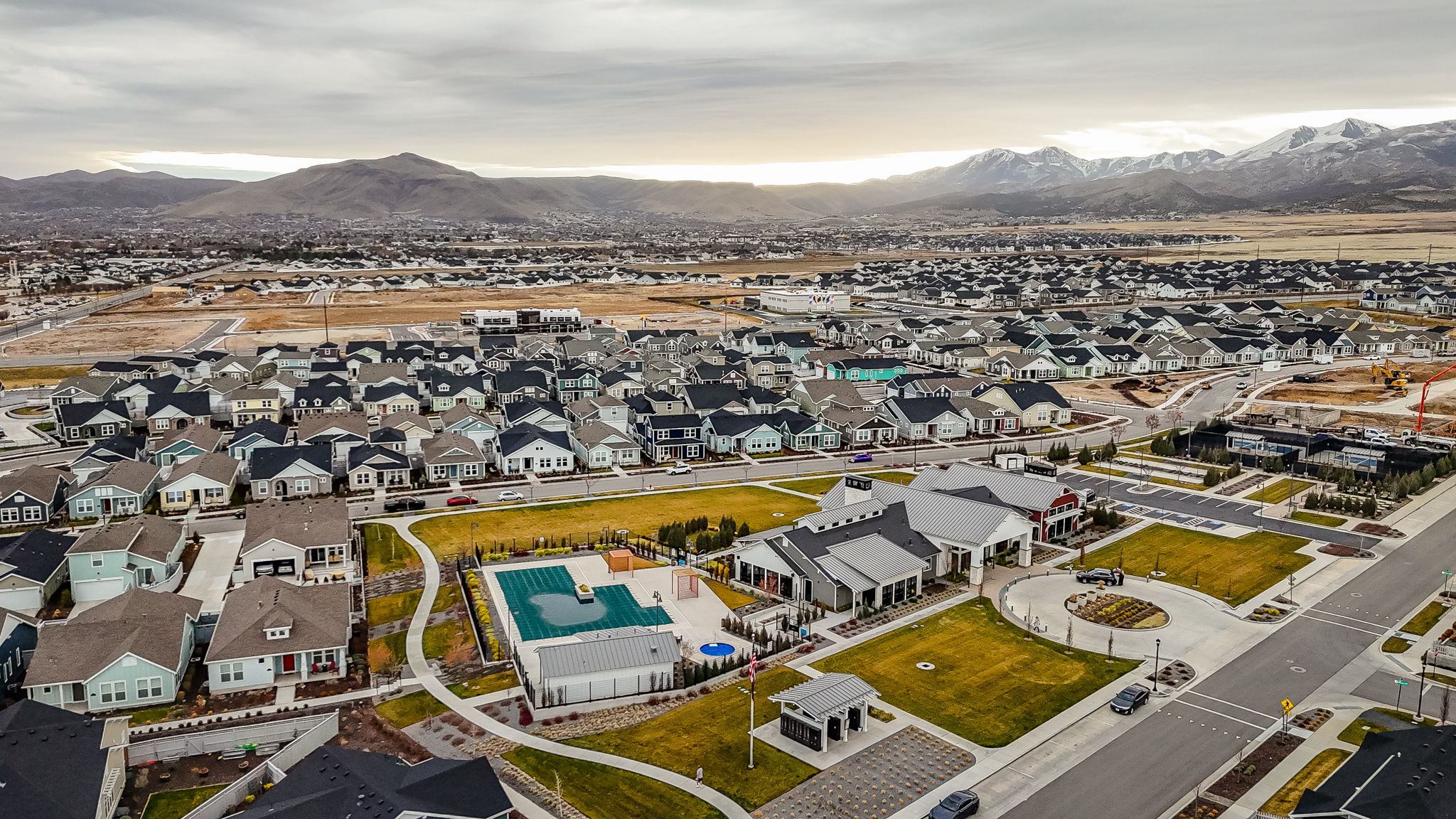 Aerial view of residential area with a mountainous background