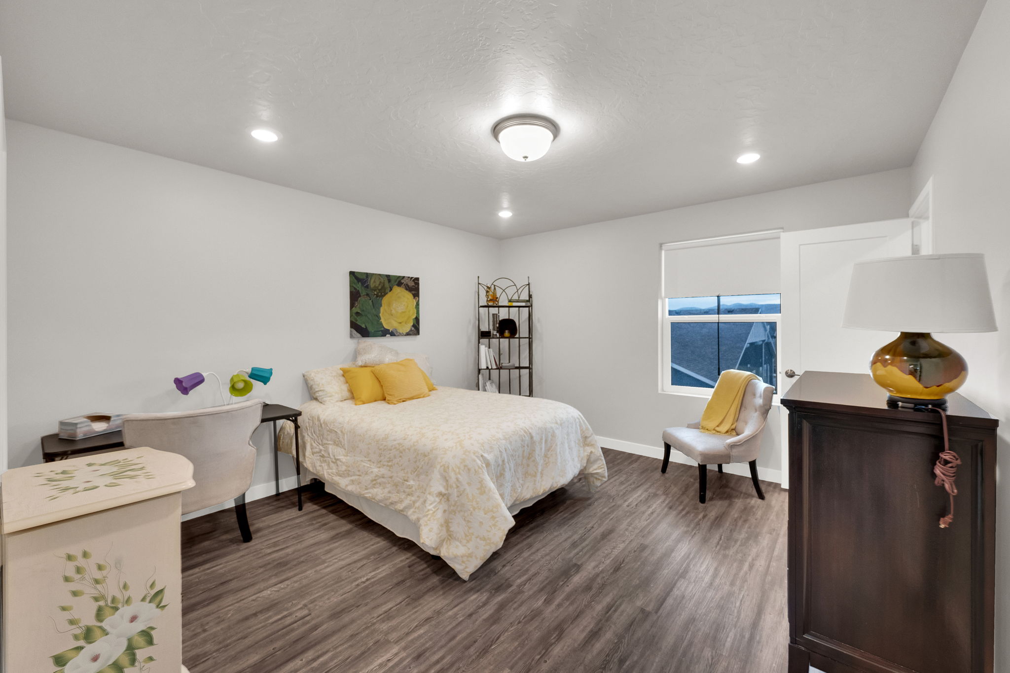 Bedroom featuring recessed lighting, dark wood-type flooring, and a textured ceiling