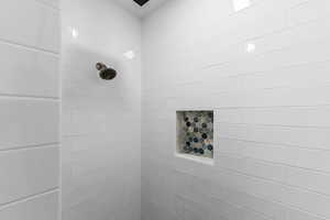Bathroom view of tiled shower