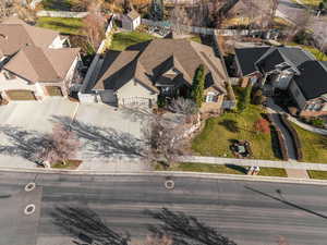 Aerial view of property's location featuring nearby suburban area