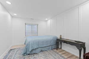 Bedroom featuring recessed lighting and light wood-style floors