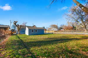 View of fenced backyard