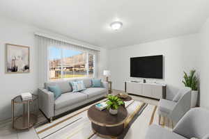 Virtual Staging. Living room featuring tile patterned flooring and baseboards