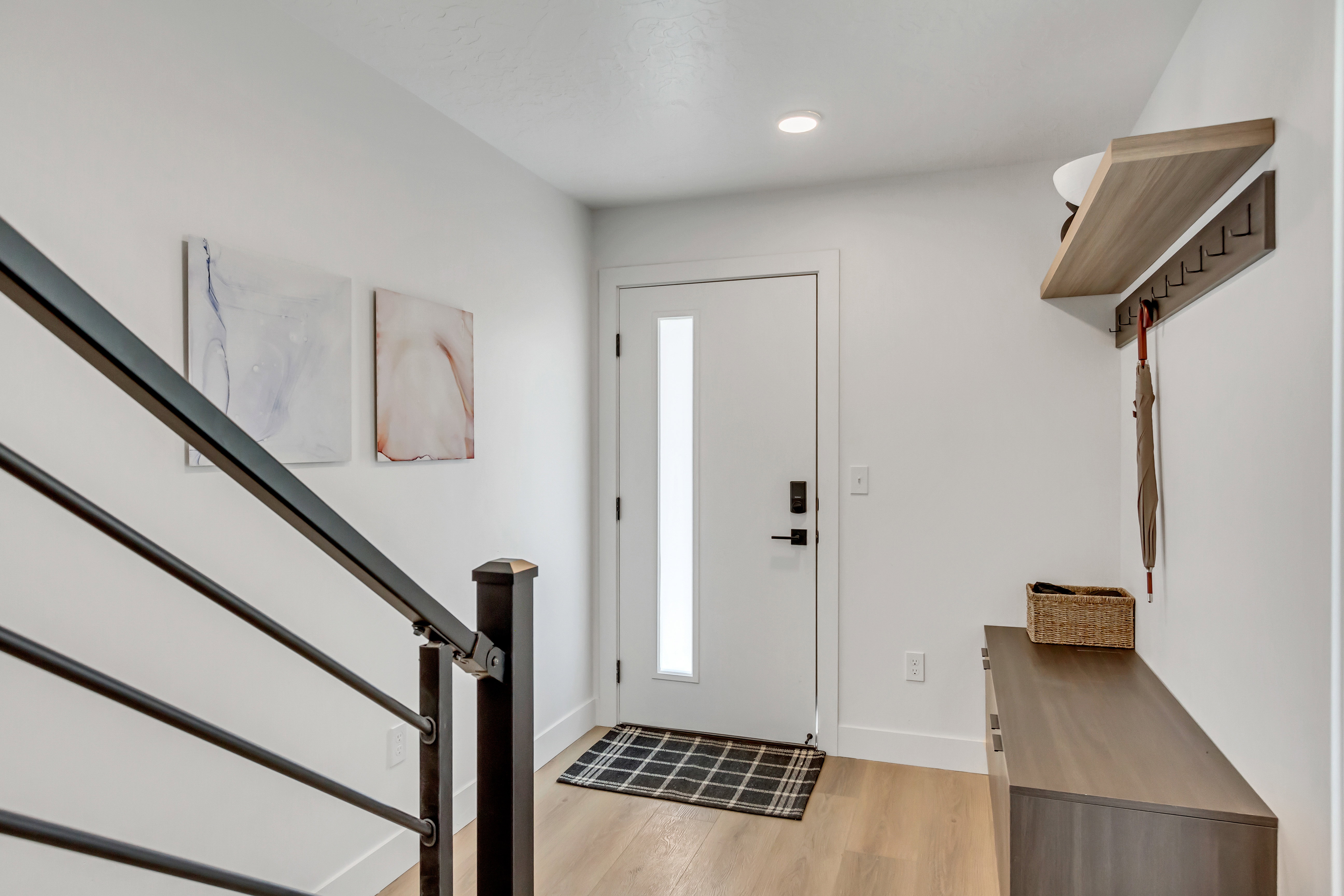 Entrance foyer featuring light wood-type flooring and recessed lighting
