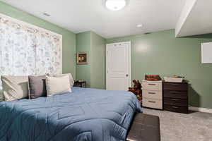 View of carpeted bedroom