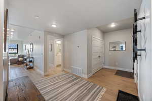 Entrance foyer with light wood finished floors