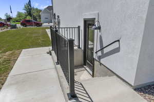 Exterior space featuring stucco siding