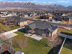 Aerial view of residential area featuring a mountainous background