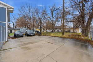 View of parking featuring a residential view
