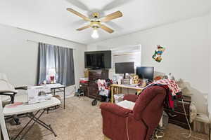 Office featuring carpet flooring and ceiling fan