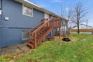 Back of house with stairway