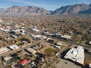 Aerial overview of property's location with a mountainous background