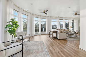 Sunroom / solarium featuring healthy amount of natural light