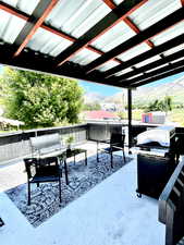 View of patio / terrace featuring a mountain view