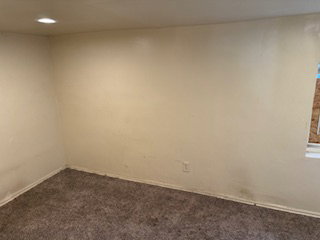 Empty room featuring carpet and recessed lighting