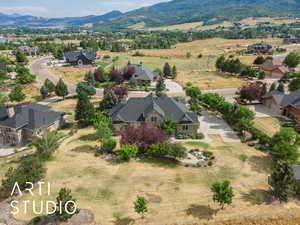 Aerial view of residential area featuring a mountain backdrop