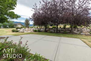 View of patio with a mountain view