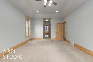 Unfurnished room with a ceiling fan, recessed lighting, and carpet