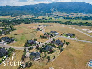 Aerial view of property's location with mountains