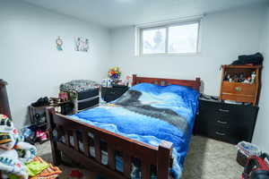 View of carpeted bedroom