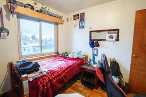 Bedroom featuring wood finished floors