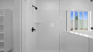 Bathroom featuring walk in shower