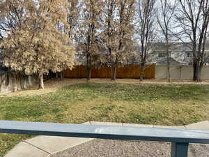 View of fenced backyard