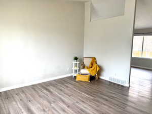 Unfurnished room featuring wood finished floors