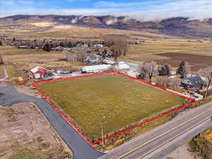 View of property location featuring a mountainous background and property parcel outlined