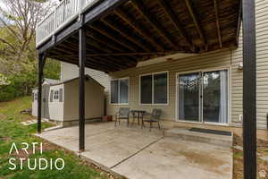 View of patio / terrace featuring an outbuilding