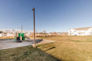 Communal playground featuring a yard