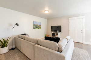 Living area featuring baseboards