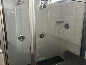 Full bath featuring a stall shower