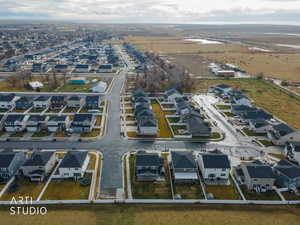 Aerial overview of property's location featuring nearby suburban area