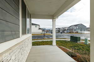 Porch featuring a residential view
