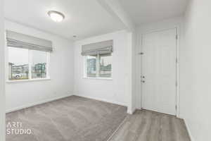 Entryway featuring baseboards