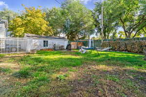 View of fenced backyard
