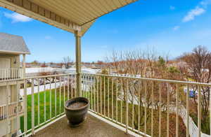 Balcony featuring a residential view