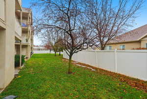 View of fenced backyard