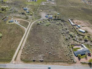Aerial view of property and surrounding area with rural landscape