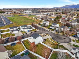 Aerial view of residential area featuring mountains