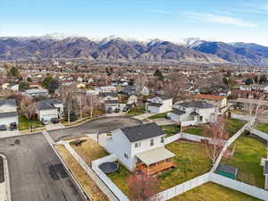 Aerial view of residential area with a mountain backdrop
