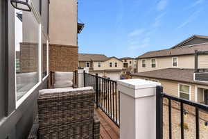 Balcony featuring a residential view