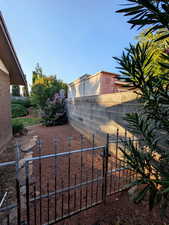 View of yard featuring a gate