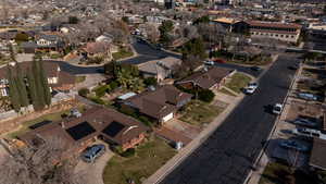 Aerial view of property's location featuring nearby suburban area
