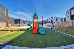 Community playground featuring a residential view