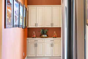 Bar with white cabinetry
