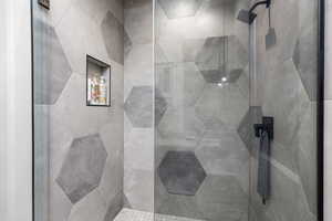 Full bath with a shower stall