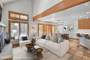 Tiled living area featuring a fireplace and recessed lighting