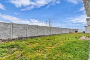 View of fenced backyard